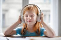 Photo of girl listening to music